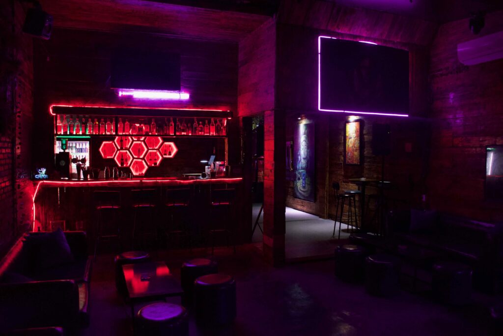 The ambience of the Saga Bar feels like an industrial dance club.
